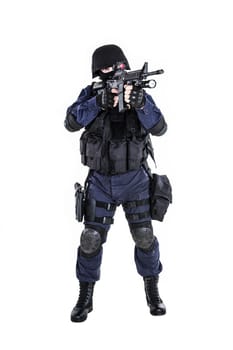 Special weapons and tactics (SWAT) team officer with his gun