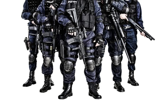 Special weapons and tactics (SWAT) team officers with guns
