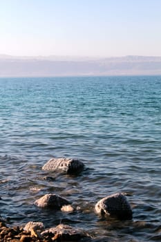 Dead Sea coastline, whit salt crystals and formations in the sand. Jordan