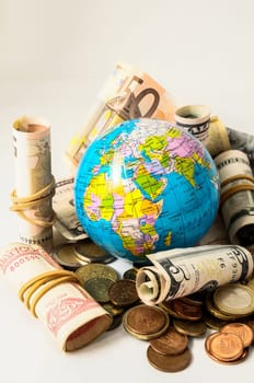 Globe Earth and Money on a White Background