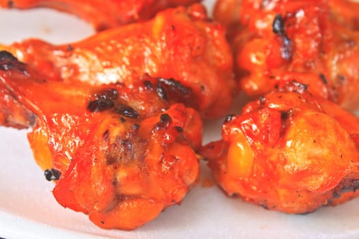Delicious grilled chicken on a white plate
