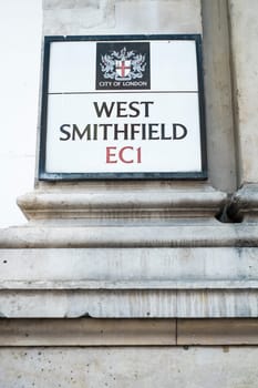 LONDON, UK - FEBRUARY 16: Detail of street signs in Smithfield meat market.The building is over one hundred and forty years old, but the market has been in the same site for almost one thousand years. February 16, 2014 in London.