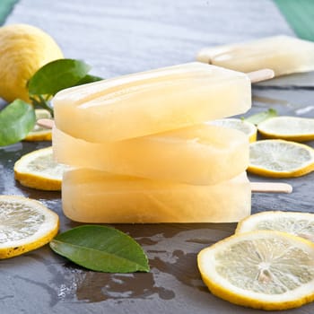 Fresh citone ice cream on a stick on rustic slate
