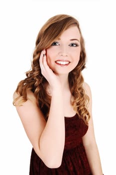 A closeup portrait picture of a young pretty teenager with long curly hair.and blue eyes, for white background..