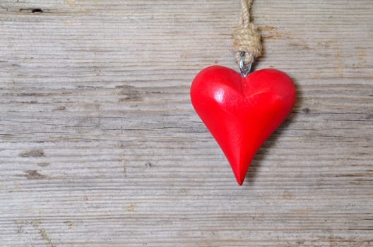 red heart on wood