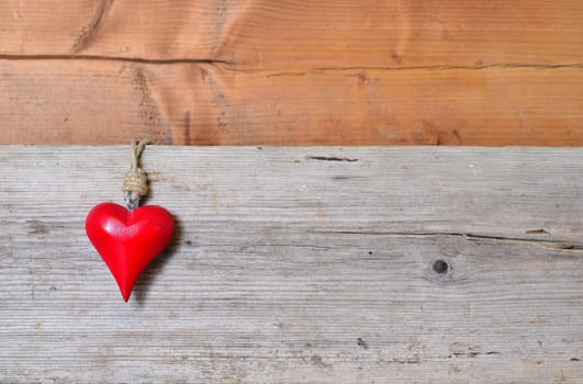 red heart on wood