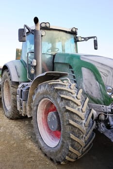 Dirty tractor on a construction site