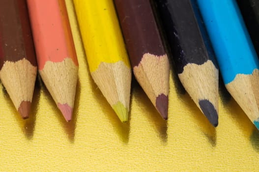New Pencils Textured Set on a Colored Background