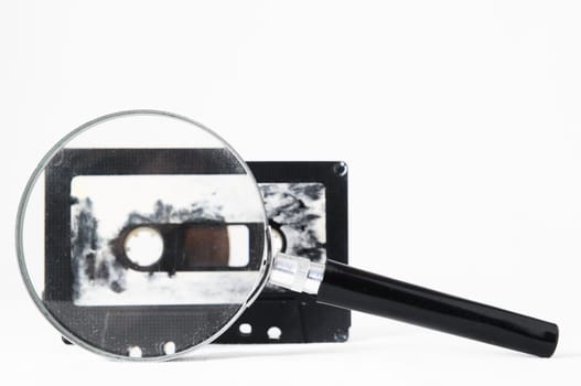 Ancient Vintage Used Musicassette over a White Background