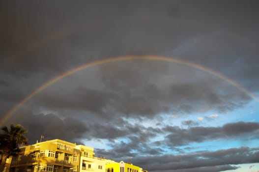 Colored Rainbow over a Cloudy Sky in Tenrife Canary Islands
