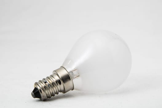 Two Different Old Incandescent Light Bulbs on a White Background