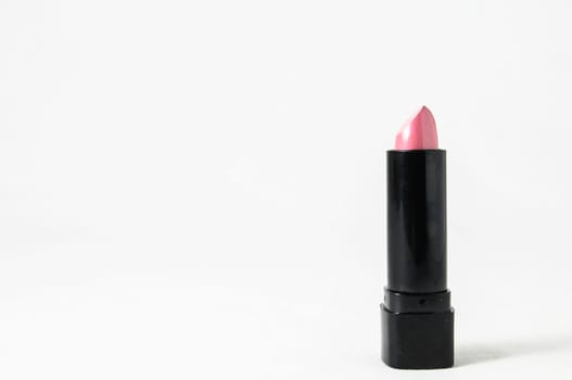 Lipstick in Black Container on a white background