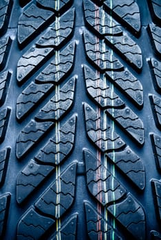 fragment of new vehicle or car tire,with visible tread and color mark.