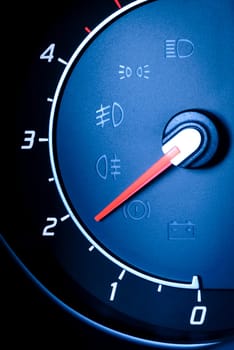 photo presents the car's vehicle's speedometer or tachometer with visible information display - ignition warning lamp and brake system warning lamp,visible symbols of the instrument cluster (check the warning light).