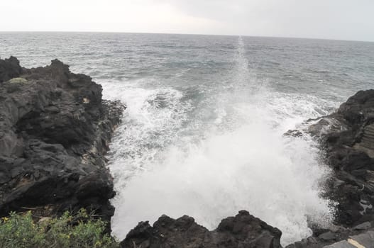 Strong Waves Crashing on the Volcanic Coast in Tenerife Canary Islands