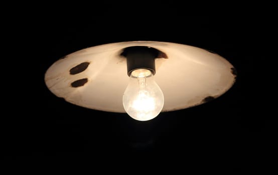 Close-up of an old factory lamp