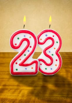 Burning birthday candles number 23