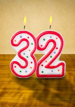 Burning birthday candles number 32