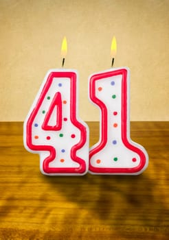 Burning birthday candles number 41