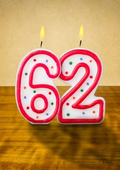 Burning birthday candles number 62