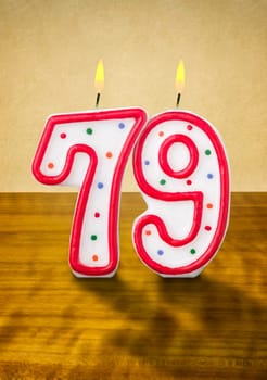 Burning birthday candles number 79