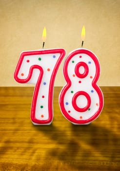 Burning birthday candles number 78