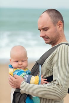 Baby and father outdoor portrait