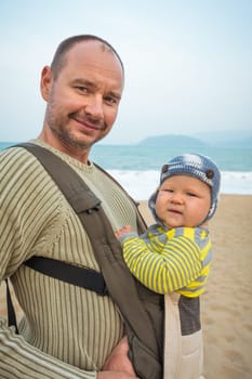 Baby and father outdoor portrait