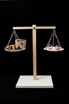 Time is Money Concept Clock and Currency on a Two Pan Balance