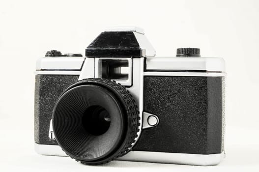 Classic 35mm Plastic Toy Photo Camera on a White Background