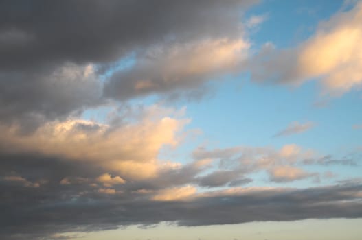 Cloudscape, Colored Clouds at Sunset near the Ocean