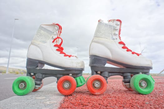 Hdr Picture of Old Vintage White Skate Boot on the Asphalt Sterret