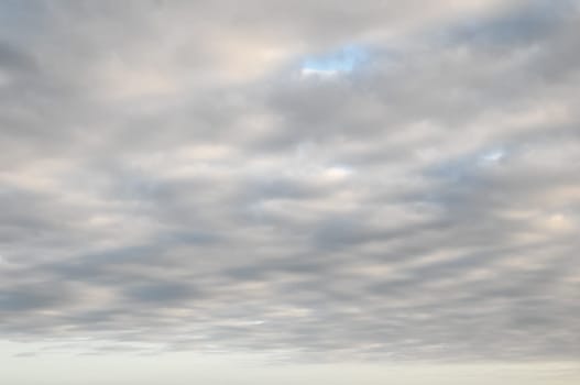 Cloudscape, Colored Clouds at Sunset near the Ocean