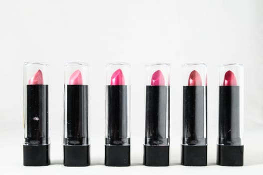 Lipstick in Black Container on a white background