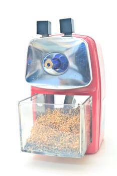 red pencil sharpener on white background