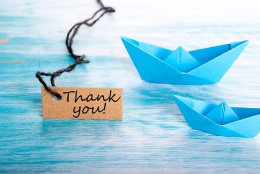 Thank You on a Tag with a Boat Background