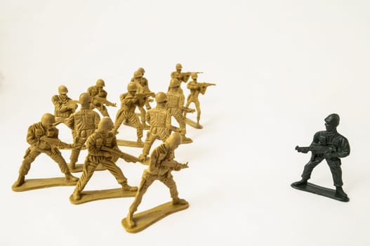 Plastic Lead Soldiers Representing War on a White Background