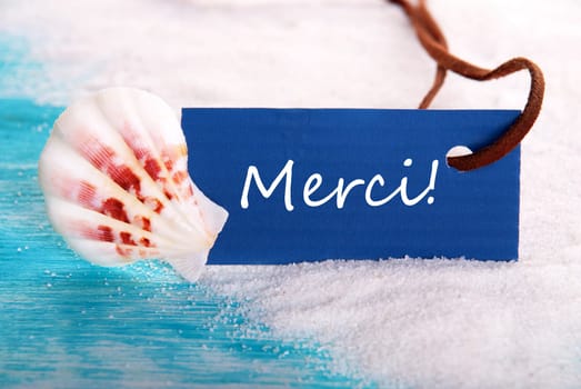Nautical Background with Label with the French Word Merci which Means Thanks