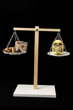 Skull and Money on a Two Pan Balance