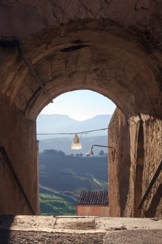 View of arch in Leonforte, baroque town in Sicily