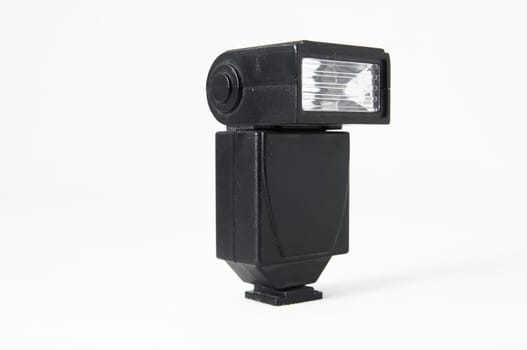 Black Photo Camera Flash on a White Background