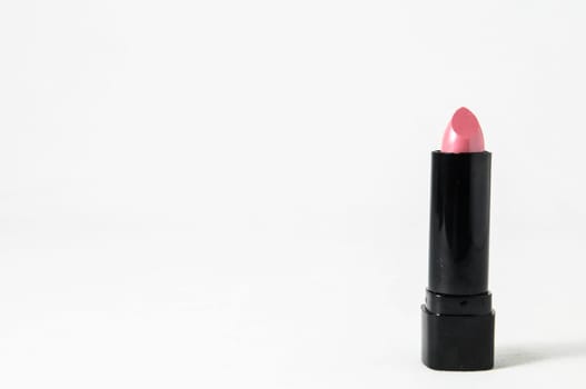 Lipstick in Black Container on a white background