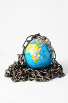 Earth globe close in chain and padlock