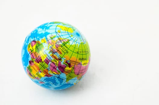 The World Globe Made of Rubber on a White Background