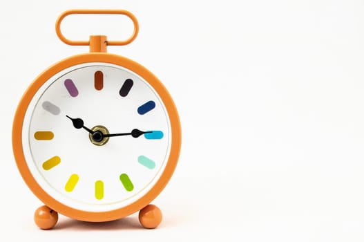 Orange Alarm Clock on a White Background