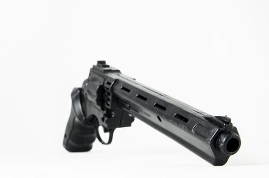 Black Revolver Pistol Gun on a White Background