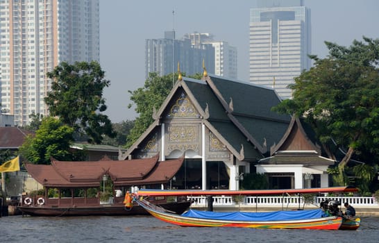 A boat on the Mae Nam Chao Phraya River in the capital Bangkok of Thailand in South East Asia.