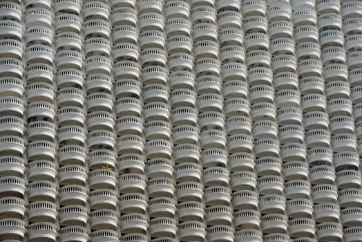 A skyscraper with many balconies on the Mae Nam Chao Phraya River in the capital Bangkok of Thailand in South East Asia.