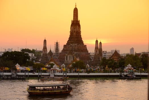 The temple complex of Wat Arun on the Mae Nam Chao Phraya River in the capital Bangkok of Thailand in South East Asia.