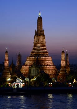 The temple complex of Wat Arun on the Mae Nam Chao Phraya River in the capital Bangkok of Thailand in South East Asia.
